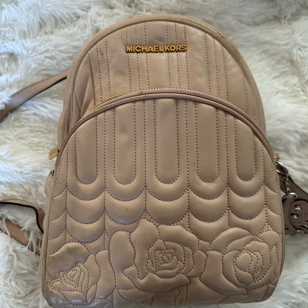 Pink Michael Kors backpack
